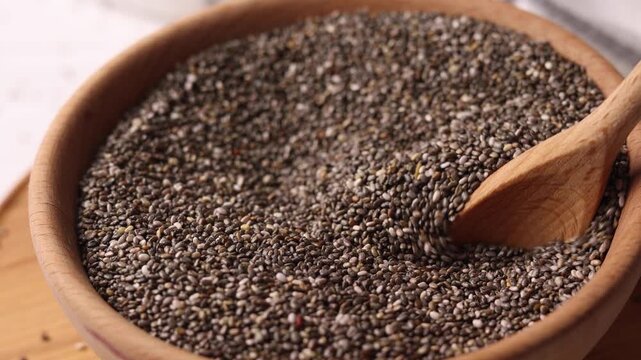 chia seeds on a light background. Useful supplements, super food, healthy food, veggie