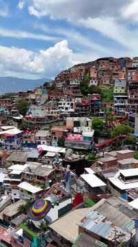Cinematic Drone Footage of Comuna 13 Medell&iacute;n &ndash; Urban Transformation, Cable Cars, Escalator and City Life