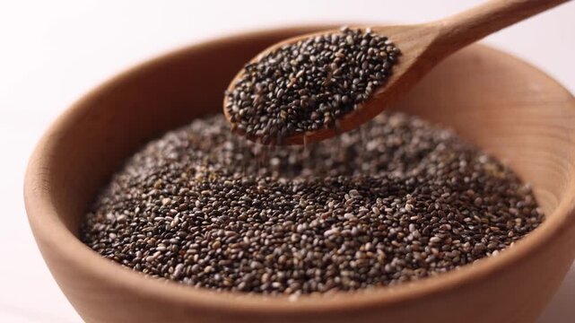 chia seeds on a light background. Useful supplements, super food, healthy food, veggie
