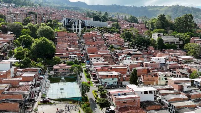 Aerial Drone Footage of Medell&iacute;n Cable Car System &ndash; Comuna 13 Urban Landscape and Mountain City