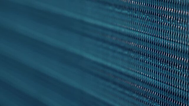 Close Up Shot Of A Metal Mesh Grill On An Industrial Manufacturing Machine. Focus Shift, Shallow Depth Of Field.
