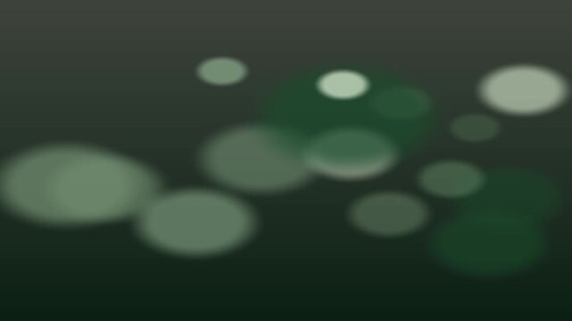Abstract Dim Green Bokeh Circles Floating Across Dark Background