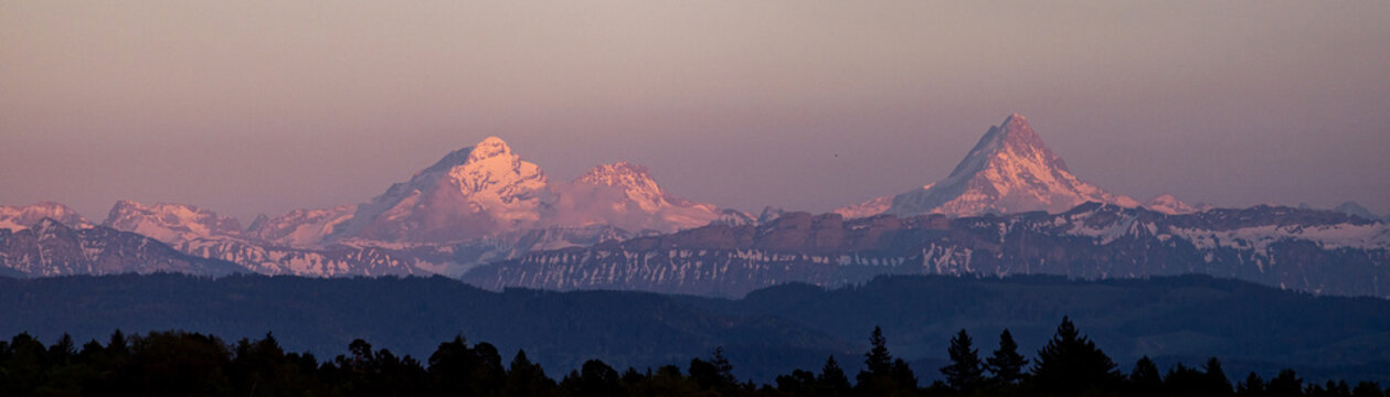 parts of the berner alps from far panorama