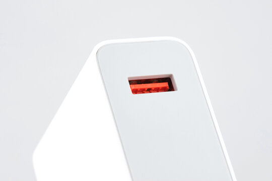 The charger is universal for a phone, laptop, isolated 