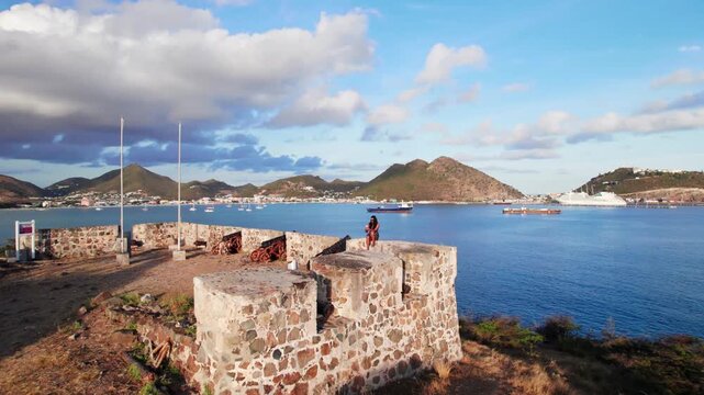 Slow majestic rise over the beach at Simpson Bay showing the bridge and lagoon.
