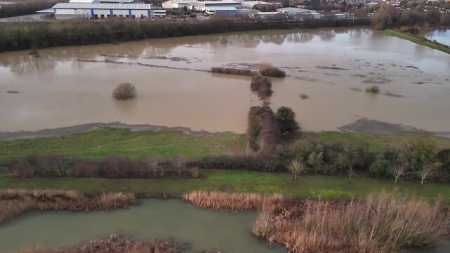 Aerial View of Flooded Fields With Industrial Estate and Freight Train in Barton Seagrave Northamptonshire