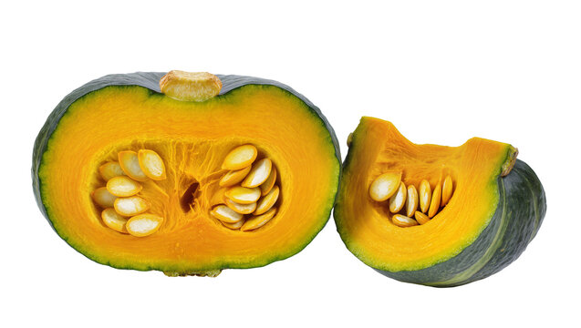 Blue skinned Kabocha pumpkin halves with orange flesh and seeds