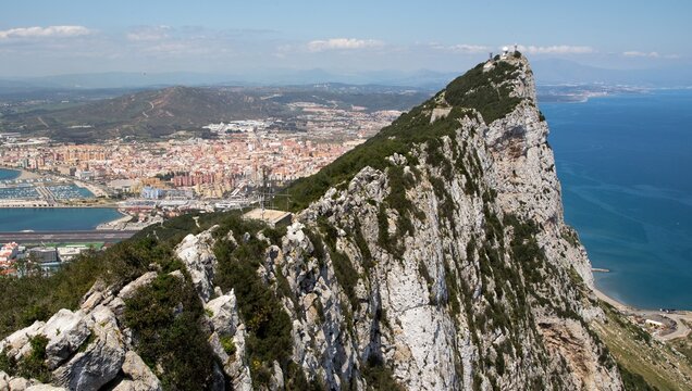 View over the Gibraltar Rock, the Mediterranean Sea and the Spanish city La Linea de la Conception.