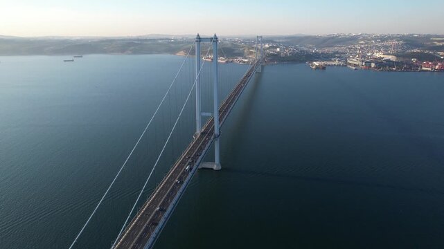 Osmangazi Bridge in Kocaeli, Turkey. Aerial shot with drone. Beautiful sunset landscape.