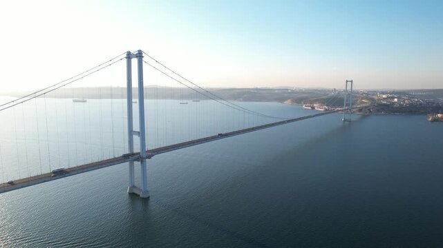 Osmangazi Bridge in Kocaeli, Turkey. Aerial shot with drone. Beautiful sunset landscape.