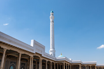 Islamic architecture with a minaret and a dome in Uzbekistan. © Bakhodir