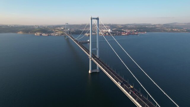 Osmangazi Bridge in Kocaeli, Turkey. Aerial shot with drone. Beautiful sunset landscape.