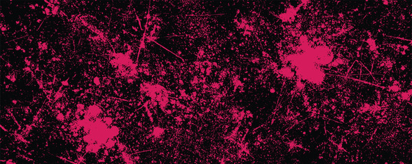 Pink paint splatter and scratch texture on black background © Zbrake Studio