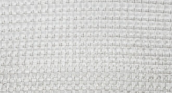 fabric texture - close-up of textured fabric with intricate weave pattern and subtle sheen