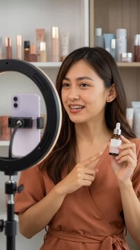 Young woman is live streaming introducing beauty products