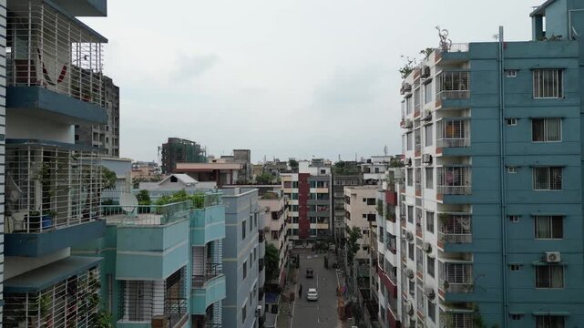 Aerial drone view of central Dhaka city skyline cinematic urban landscape Bangladesh 4K