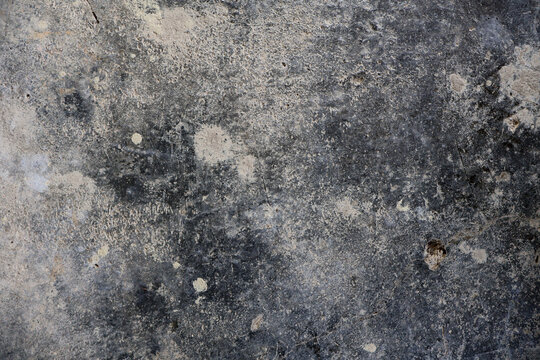 Dark Gray Concrete Grunge Texture Background with Crack and Distressed Surface. Old Rough Stone Wall with Spotted Weathered Pattern and Dirty Overlay
