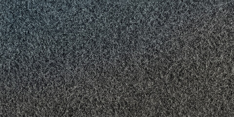Fototapeta premium Close-up of a Textured Fabric, demonstrating its intricate details and appealing the unique surface.