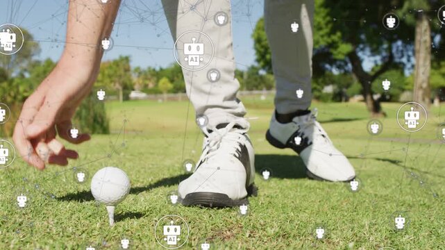 Male golfer reaching down placing ball on tee stepping swinging for drive AI overlay tracking swing