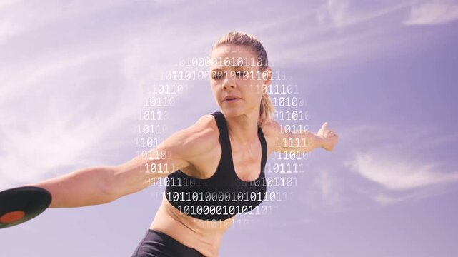 Woman bracing core turning hips releasing disc, binary ring forming around torso for sports tech
