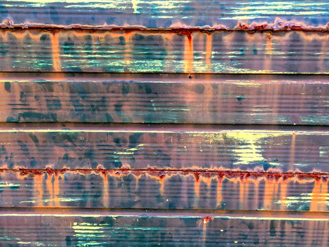 Lined rusted and painted weathered metal background patina