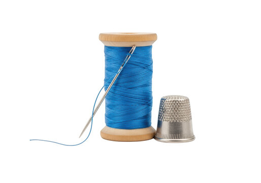 Spool of blue thread with a sewing needle and a metal thimble isolated on transparent background