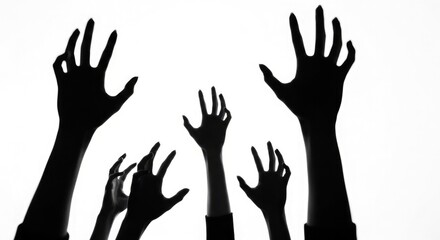 Fototapeta premium Reaching hands a dramatic silhouette of multiple arms extending upwards
