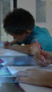 Vertical video: Two boys writing cam pan as pink pencil entering frame blue overlay aiding learning