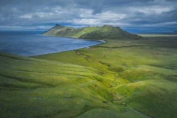 Aerial view of Umnak Island coastline and volcanic tundra, Aleutian Islands, Alaska © Mariana Ianovska