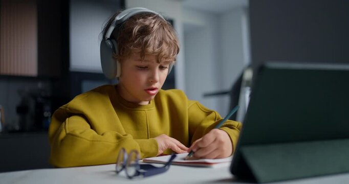 Young Learners Utilize Digital And Traditional Resources Within Modern Kitchen Surroundings
