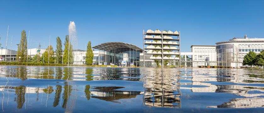 Munich, Germany &ndash; Modern buildings and entrance area of Messe M&uuml;nchen exhibition center in Messestadt Riem.