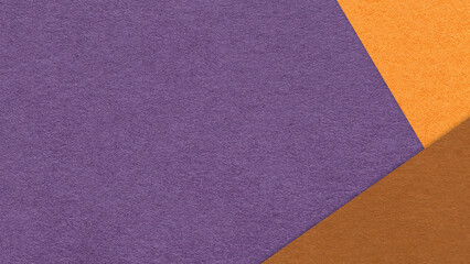Fototapeta premium Dark violet textured paper background with orange brown triangular corners and copy space. Template for presentation, banner