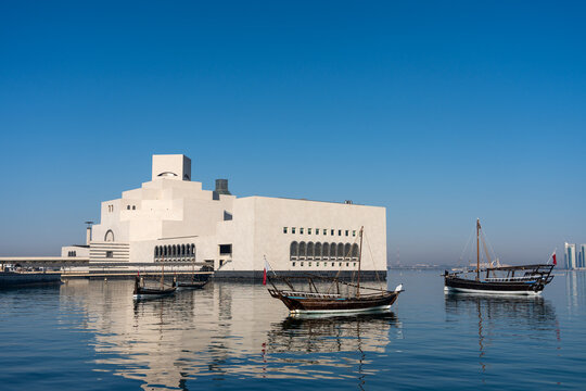 Traditional Dhow Boats Floating Before Museum of Islamic Art Doha Qatar