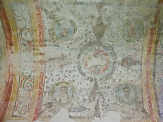 Fototapeta premium Painting on the ceiling of an ancient christian burial room in the necropolis of Pecs, Hungary 