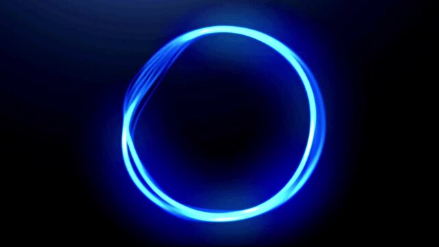 Blue neon circle pulses with rhythmic energy waves in a sleek and modern abstract animation.