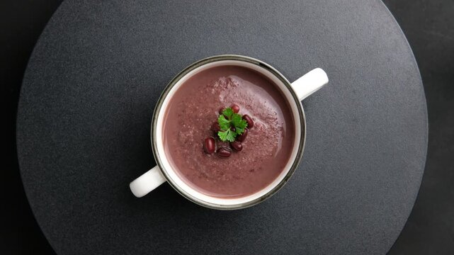 Azuki beans soup,Healthy red bean soup in white bowl,great source of nutrients and protein.Top view.