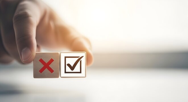 Decision making hand choosing a checkmark over an x symbol