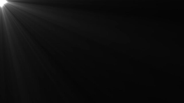 Bright white lens flare overlay with glowing light rays emanating from corner on deep black background for cinematic transitions and motion to add ethereal