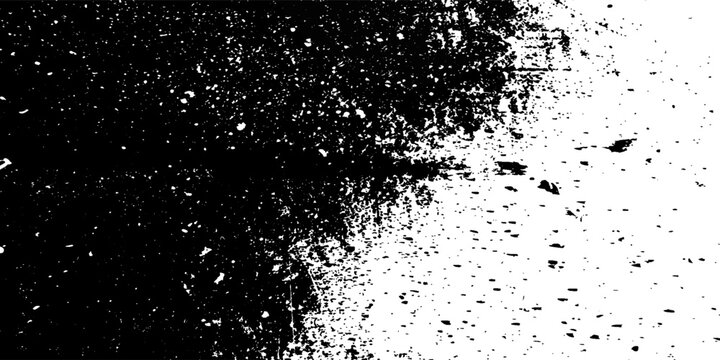 A grunge texture transitions from black to white with speckles and spots.