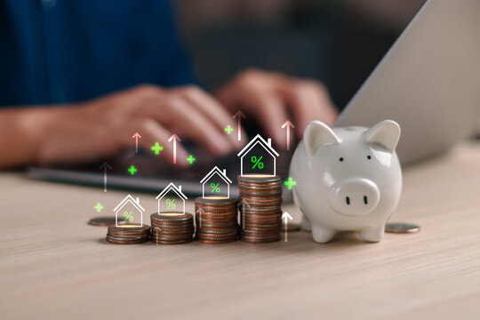 Savings and Real estate investment concept with piggy bank and stacked coins, featuring financial growth, interest rate increase, wealth management, and personal finance planning in modern economy