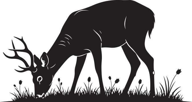 Black silhouette of deer with antlers grazing in grass