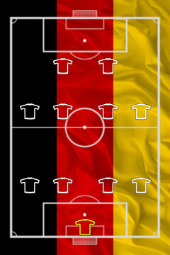 A 442 football formation against the backdrop of the German flag.