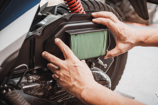 installing-new-motorcycle-air-filter.jpg