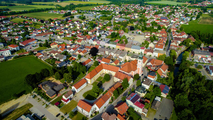 Obraz premium Aerial view around the city and monastery Gangkofen in Germany., Bavaria on a sunny afternoon in spring.