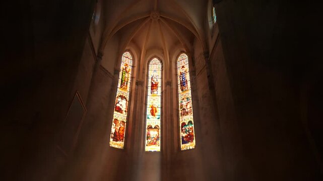 Sunlight through Stained Glass in Issigeac Church