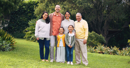 Fototapeta premium Grandparents, parents and kids in nature with portrait for bonding, relationship and connection. Happy, family and senior generation with children in park for love, trust or laugh together on weekend