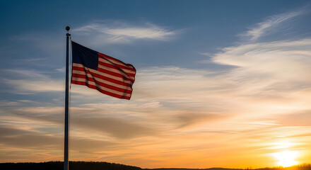 Fototapeta premium American flag waving at sunset with vibrant sky