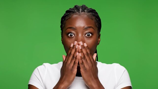 Surprised woman with shocked expression on Video Greenscreen background