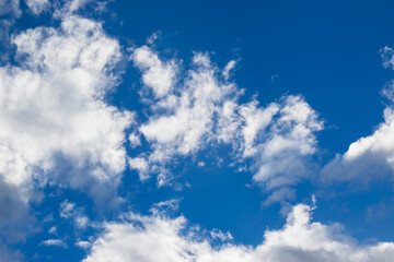 Fototapeta premium Beautiful blue sky with white fluffy clouds, natural daytime image, cloudscape with copy space. Scenic beauty of nature of Leh, Ladakh, India. Ladakh is known for clear atmosphere, bright environment.