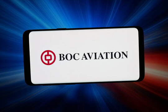 Stuttgart, Germany - 04-23-2026: In this photo illustration, the logo of aircraft leasing company BOC Aviation Limited is displayed on a smartphone in front of abstract background on computer screen.